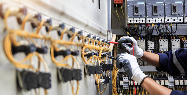 Professional Electrician technician working in Peabody, MA